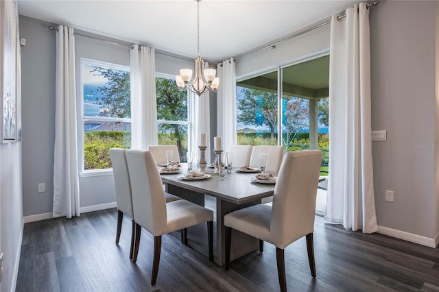 3224 Arch Ave, Ormond Beach, FL 32174 - dining room featuring a chandelier, dark wood-type flooring, and plenty of natural light
