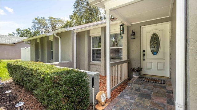 5177 Chesapeake Ave, Orlando, FL 32808 - doorway to property with stucco siding