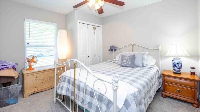 5177 Chesapeake Ave, Orlando, FL 32808 - bedroom with light colored carpet, a closet, and ceiling fan