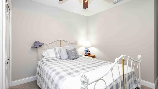 5177 Chesapeake Ave, Orlando, FL 32808 - carpeted bedroom featuring baseboards and a ceiling fan