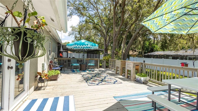 5177 Chesapeake Ave, Orlando, FL 32808 - wooden deck with outdoor dining space