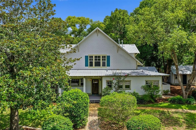 408 W Pearl St, Minneola, FL 34715 - view of front of property with a metal roof