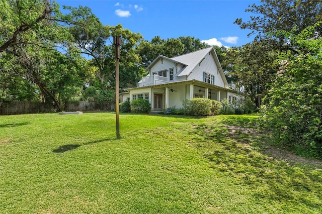 408 W Pearl St, Minneola, FL 34715 - view of front of home featuring a ceiling fan and a balcony