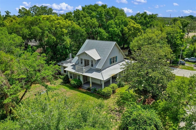 408 W Pearl St, Minneola, FL 34715 - view of subject property featuring a heavily wooded area