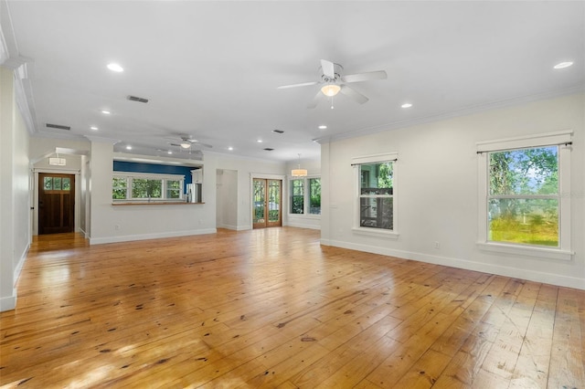 408 W Pearl St, Minneola, FL 34715 - unfurnished living room featuring a ceiling fan, ornamental molding, light wood-style flooring, and recessed lighting