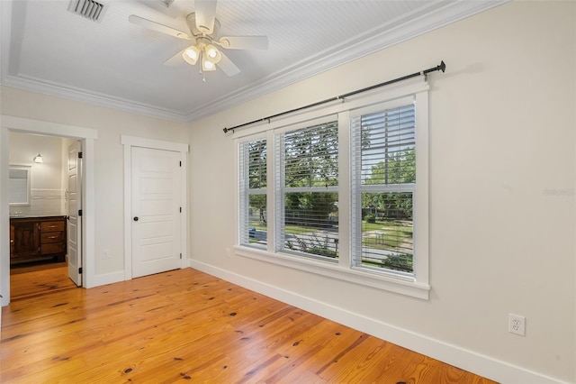 408 W Pearl St, Minneola, FL 34715 - spare room with crown molding, light wood-type flooring, and ceiling fan