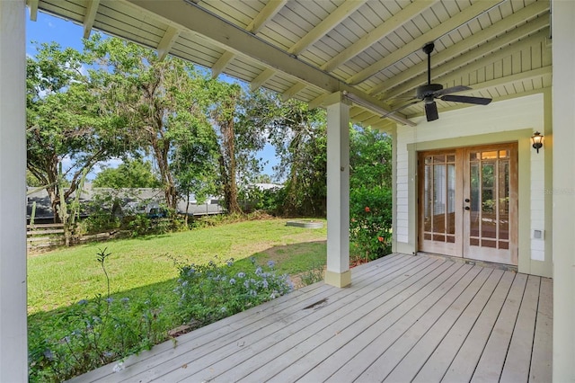 408 W Pearl St, Minneola, FL 34715 - deck featuring french doors, a yard, and a ceiling fan