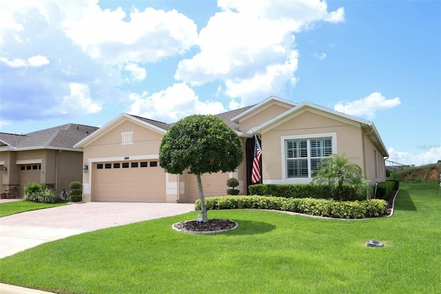 3574 La Jolla Dr, Clermont, FL 34711 - single story home featuring stucco siding, driveway, a front lawn, and an attached garage