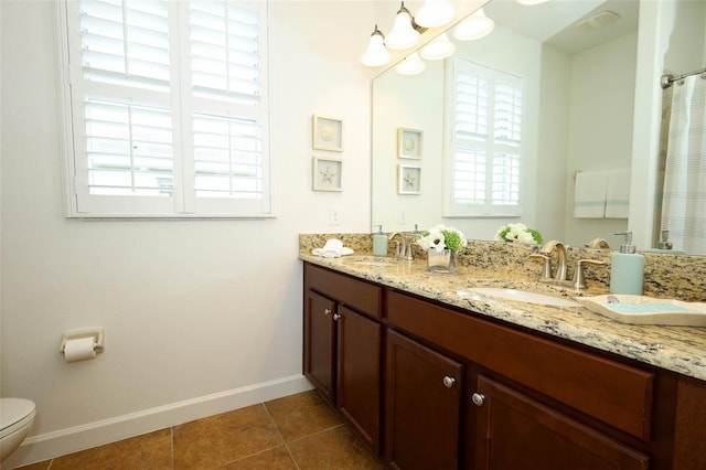 3574 La Jolla Dr, Clermont, FL 34711 - bathroom with a chandelier, plenty of natural light, double vanity, and tile patterned flooring