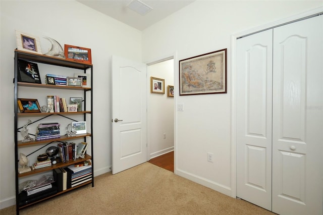 3574 La Jolla Dr, Clermont, FL 34711 - hallway with carpet floors and baseboards
