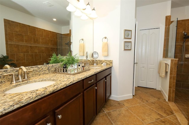3574 La Jolla Dr, Clermont, FL 34711 - full bathroom with double vanity, walk in shower, tile patterned flooring, and a closet