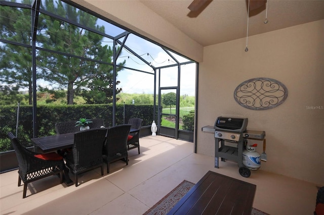 3574 La Jolla Dr, Clermont, FL 34711 - sunroom with ceiling fan and outdoor dining space