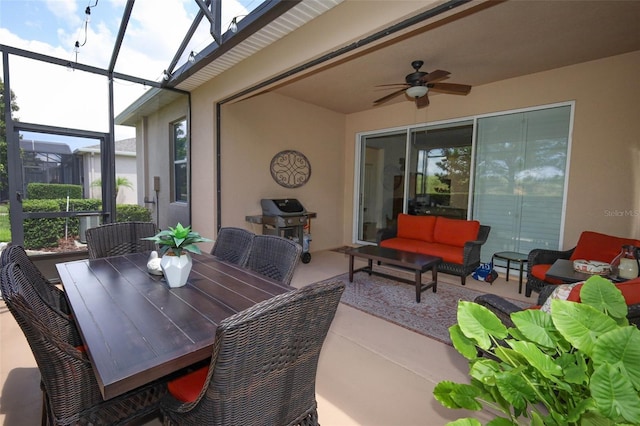3574 La Jolla Dr, Clermont, FL 34711 - view of patio with ceiling fan, grilling area, an outdoor hangout area, glass enclosure, and outdoor dining area