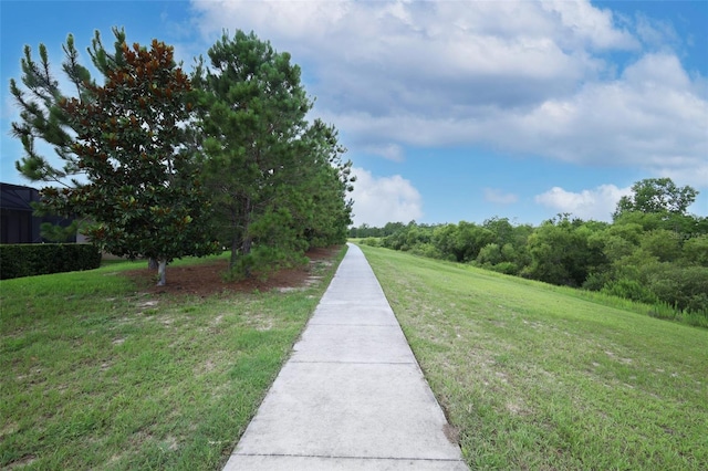 3574 La Jolla Dr, Clermont, FL 34711 - view of property's community featuring a lawn