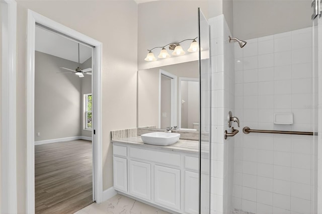 632 Bridge Creek Blvd, Ocoee, FL 34761 - full bath featuring vanity, a ceiling fan, and tiled shower