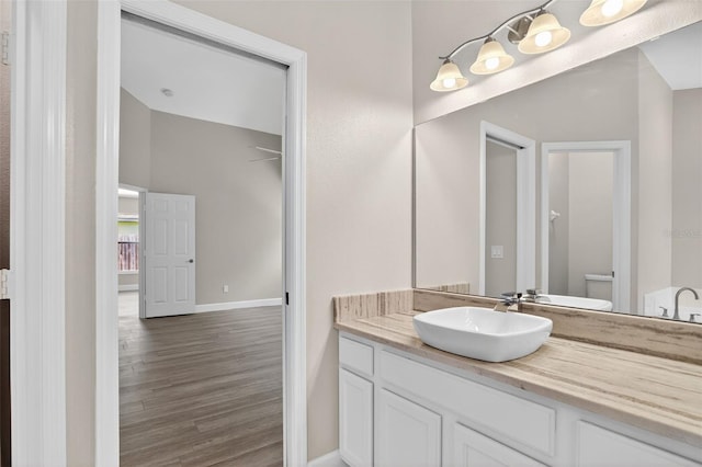 632 Bridge Creek Blvd, Ocoee, FL 34761 - bathroom with vanity and wood finished floors