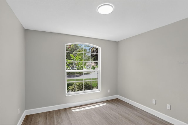 632 Bridge Creek Blvd, Ocoee, FL 34761 - spare room featuring wood finished floors and baseboards