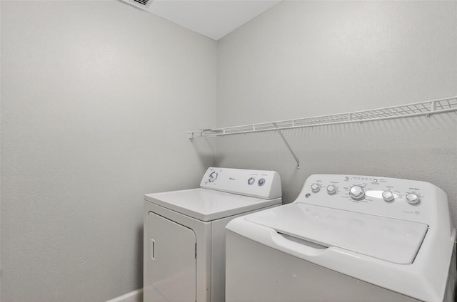632 Bridge Creek Blvd, Ocoee, FL 34761 - laundry area featuring washer and clothes dryer