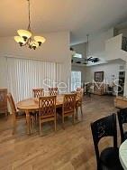 160 Calabay Parc Blvd, Davenport, FL 33897 - dining space with a chandelier