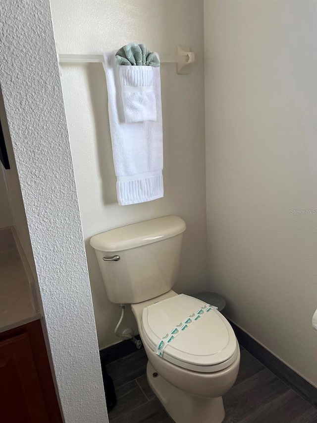 160 Calabay Parc Blvd, Davenport, FL 33897 - bathroom with toilet and wood finished floors