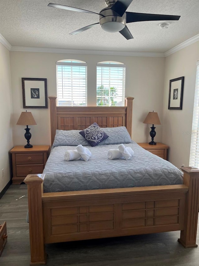 160 Calabay Parc Blvd, Davenport, FL 33897 - bedroom with a textured ceiling, wood finished floors, crown molding, and ceiling fan