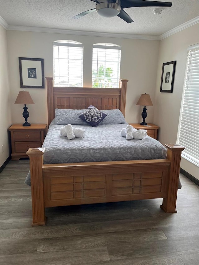 160 Calabay Parc Blvd, Davenport, FL 33897 - bedroom with wood finished floors, ornamental molding, a textured ceiling, and ceiling fan