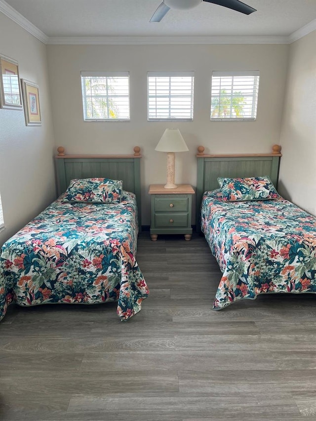 160 Calabay Parc Blvd, Davenport, FL 33897 - bedroom featuring wood finished floors, crown molding, and a ceiling fan