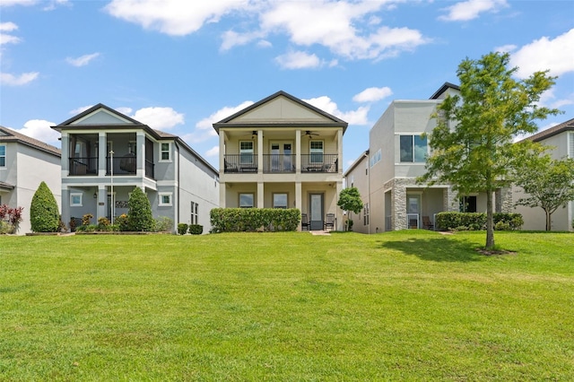 1787 White Feather Loop, Oakland, FL 34787 - view of front of home with ceiling fan, stucco siding, and a front lawn