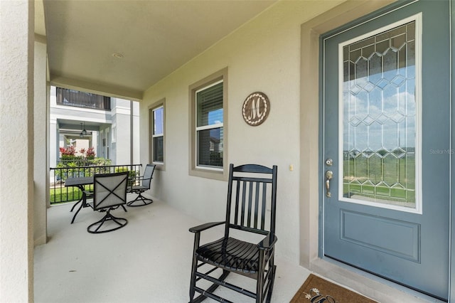1787 White Feather Loop, Oakland, FL 34787 - entrance to property featuring stucco siding and covered porch