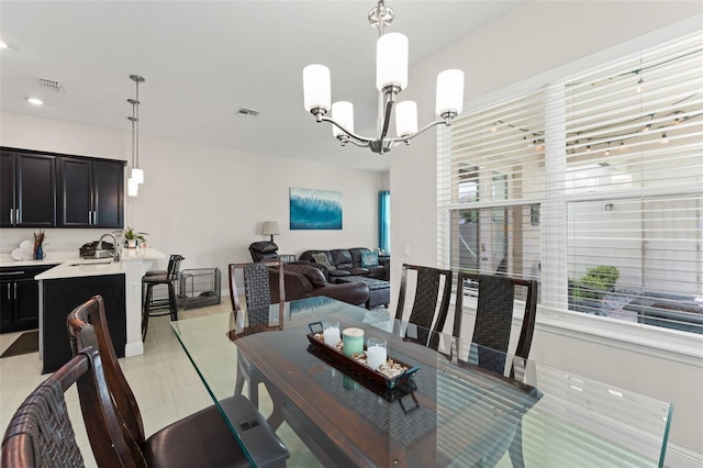 1787 White Feather Loop, Oakland, FL 34787 - dining space featuring a chandelier and recessed lighting