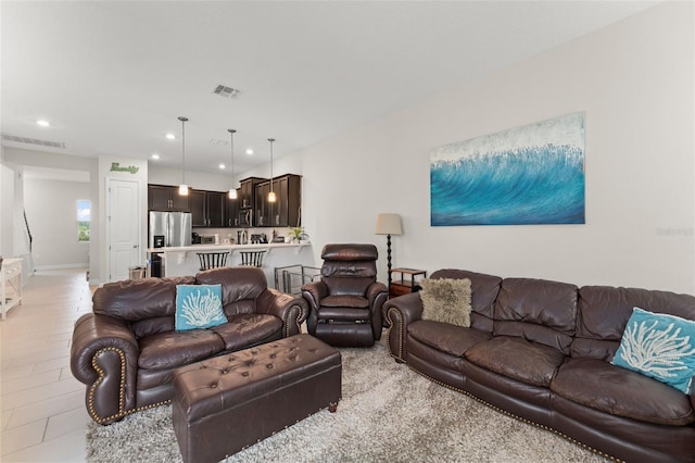 1787 White Feather Loop, Oakland, FL 34787 - living area featuring recessed lighting
