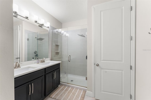1787 White Feather Loop, Oakland, FL 34787 - bathroom featuring a shower stall and double vanity