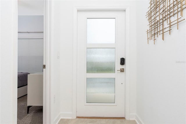 1070 Splash Shot Pl, Davenport, FL 33896 - doorway to outside with baseboards