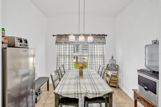 8152 Fan Palm Way, Kissimmee, FL 34747 - dining area featuring light tile patterned flooring and baseboards