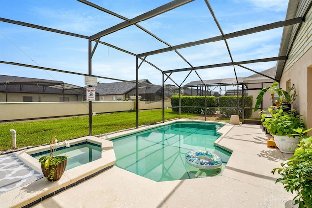 8152 Fan Palm Way, Kissimmee, FL 34747 - view of pool with a patio area, a pool with connected hot tub, and a lanai
