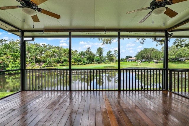 6836 Bittersweet Ln, Orlando, FL 32819 - unfurnished sunroom featuring a ceiling fan, a water view, and view of scattered trees