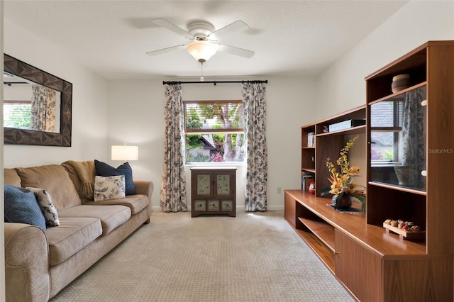 6836 Bittersweet Ln, Orlando, FL 32819 - living room featuring light carpet and ceiling fan