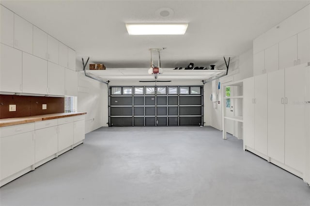 6836 Bittersweet Ln, Orlando, FL 32819 - garage with a garage door opener