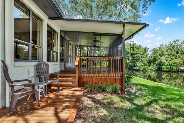 6836 Bittersweet Ln, Orlando, FL 32819 - deck with a sunroom, a water view, a lawn, and ceiling fan