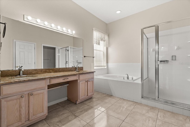 5200 Sunset Canyon Dr, Kissimmee, FL 34758 - bathroom with double vanity, a stall shower, a garden tub, and tile patterned flooring