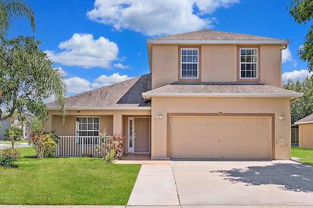 5200 Sunset Canyon Dr, Kissimmee, FL 34758 - traditional home with stucco siding, a front lawn, driveway, roof with shingles, and an attached garage