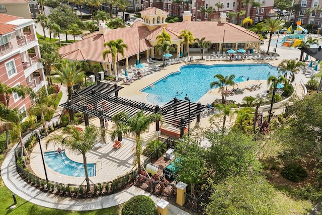 5012 Shoreway Loop Unit 10107, Orlando, FL 32819 - community pool featuring a patio
