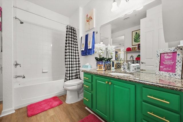5012 Shoreway Loop Unit 10107, Orlando, FL 32819 - full bathroom with wood finished floors, vanity, toilet, and shower / bath combo