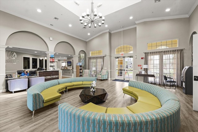 5012 Shoreway Loop Unit 10107, Orlando, FL 32819 - common area with a high ceiling, ornamental molding, and recessed lighting