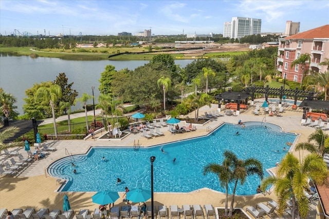 5012 Shoreway Loop Unit 10107, Orlando, FL 32819 - community pool with a pergola, a patio, and a water view
