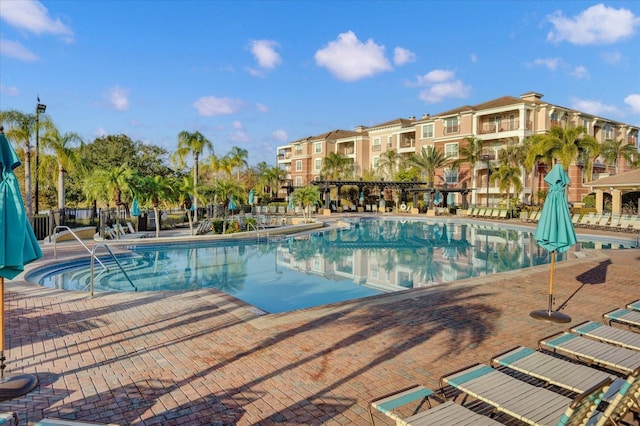 5012 Shoreway Loop Unit 10107, Orlando, FL 32819 - community pool with a patio