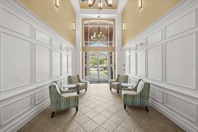 5012 Shoreway Loop Unit 10107, Orlando, FL 32819 - sunroom featuring a chandelier