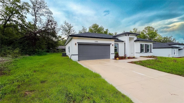 2486 W Magenta Dr, Citrus Springs, FL 34434 - view of front of home featuring stucco siding, a garage, concrete driveway, and a front yard