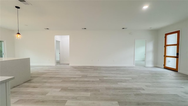 2486 W Magenta Dr, Citrus Springs, FL 34434 - spare room with light wood finished floors and recessed lighting