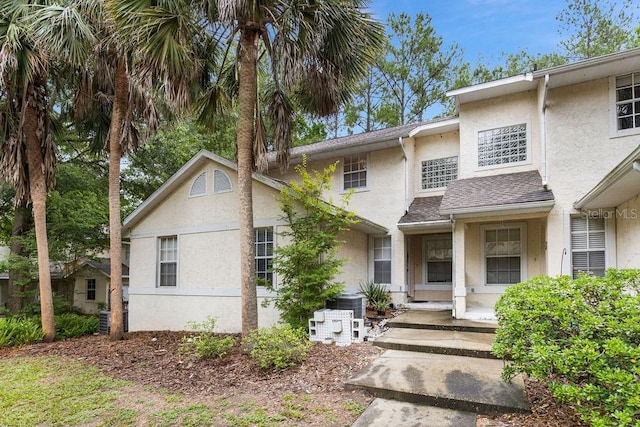 2825 NW 104th Ct Unit B, Gainesville, FL 32606 - multi unit property featuring stucco siding and central AC